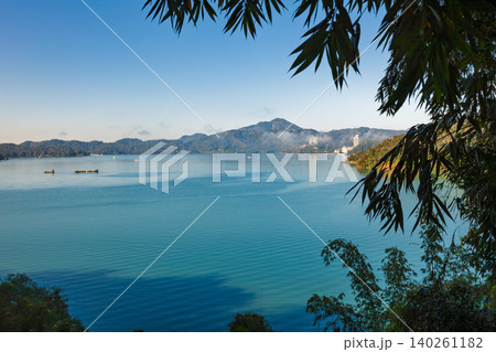 Bamboo leaves above Sun Moon Lake panorama 140261182