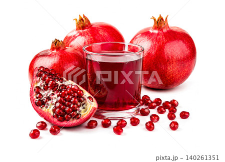 Fresh Pomegranate Fruits and Pomegranate Juice Isolated on White Background Fresh Pomegranate Fruits and Pomegranate Juice Isolated on White Background 140261351