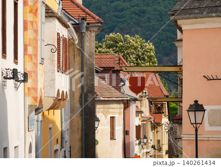 Colorful street in Krems, Austria with historic architecture and green hills Colorful street in Krems, Austria with historic architecture and green hills 140261434