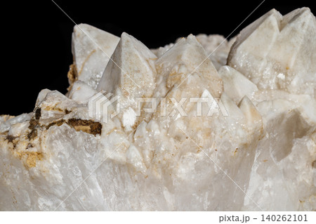 Macro mineral stone Snow quartz with calcite on a black background Macro mineral stone Snow quartz with calcite on a black background 140262101