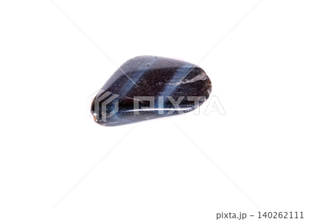 Macro mineral stone Falcon eye on a white background Macro mineral stone Falcon eye on a white background 140262111