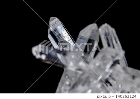 Macro Mineral Stone Rhinestone in Crystals on a Black Background Macro Mineral Stone Rhinestone in Crystals on a Black Background 140262124