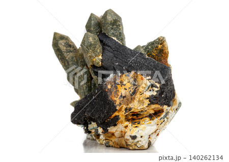 Macro mineral stone Quartz Hedenbergite Prase on ilvite on a white background Macro mineral stone Quartz Hedenbergite Prase on ilvite on a white background 140262134