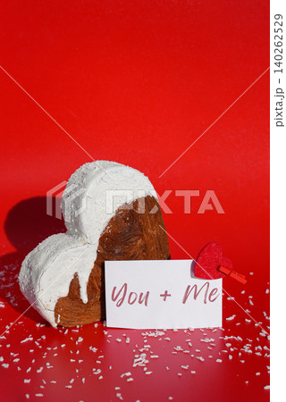 Valentine's Day You plus Me wishes saying caption on greeting card Delightful heartshaped pastry croissant treat, beautifully topped with colorful frosting galore. Copy space. Food experimentation 140262529