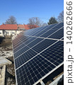 Ground-Mounted Solar Panel Array in Rural Setting - Renewable Energy Installation 140262666