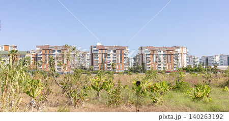 Modern residential buildings of Avsallar, Turkey, with green landscape in urban area Modern residential buildings of Avsallar, Turkey, with green landscape in urban area 140263192