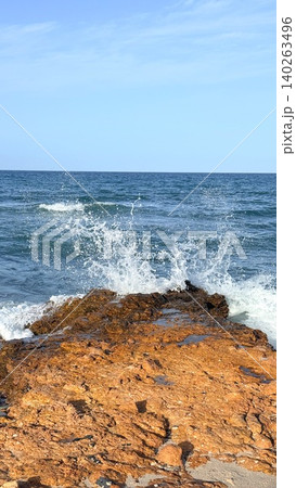 Calm Ocean Horizon. Gentle Waves Hugged Sandy Coast. Serene Seaside Landscape With Rolling Waters. Peaceful Maritime Picture Showcasing Tranquil Waves And Bright Sky Calm Ocean Horizon. Gentle Waves Hugged Sandy Coast. Serene Seaside Landscape With Rolling Waters. Peaceful Maritime Picture Showcasing Tranquil Waves And Bright Sky 140263496