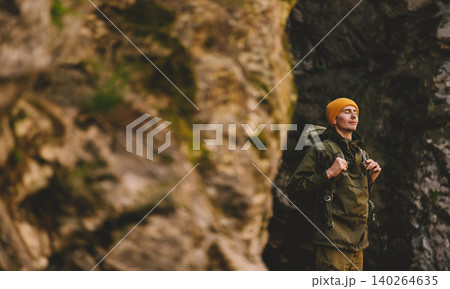 Man Hiker Exploring Canyon with Backpack Man Hiker Exploring Canyon with Backpack 140264635