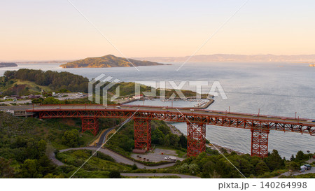Golden Gate Bridge roadway and San Francisco Bay at sunset Golden Gate Bridge roadway and San Francisco Bay at sunset 140264998
