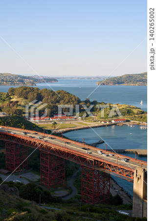Golden Gate Bridge approach road above bay and coastal park Golden Gate Bridge approach road above bay and coastal park 140265002