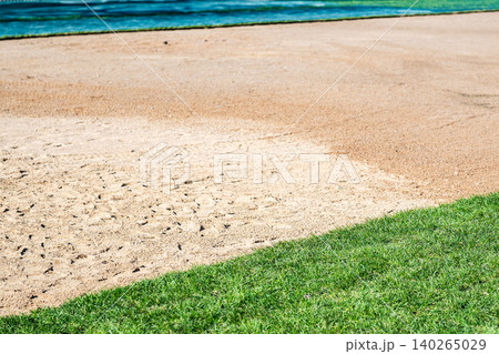 Rolled turf prepared for seasonal renewal and installation, laid on wet soil in city park Rolled turf prepared for seasonal renewal and installation, laid on wet soil in city park 140265029