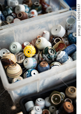 Local flower market sell tools for gardening hobby, boxes filled with used ceramic pots for plants. Local flower market sell tools for gardening hobby, boxes filled with used ceramic pots for plants. 140265637