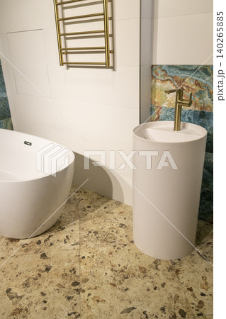 Sleek Minimalist Bathroom Layout with Terrazzo Flooring and Gold Accents Sleek Minimalist Bathroom Layout with Terrazzo Flooring and Gold Accents 140265885