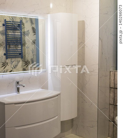 Contemporary Restroom Decor Featuring Ceramic Sink and Textured Geometric Wall Contemporary Restroom Decor Featuring Ceramic Sink and Textured Geometric Wall 140266073