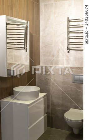 Contemporary Restroom Decor Featuring Ceramic Sink and Textured Geometric Wall Contemporary Restroom Decor Featuring Ceramic Sink and Textured Geometric Wall 140266074