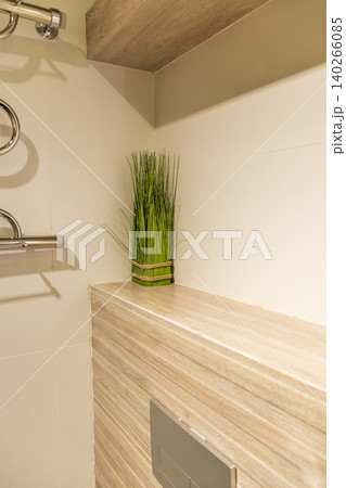 Modern Bathroom Interior Detail with Decorative Green Grass and Wood Tiles Modern Bathroom Interior Detail with Decorative Green Grass and Wood Tiles 140266085
