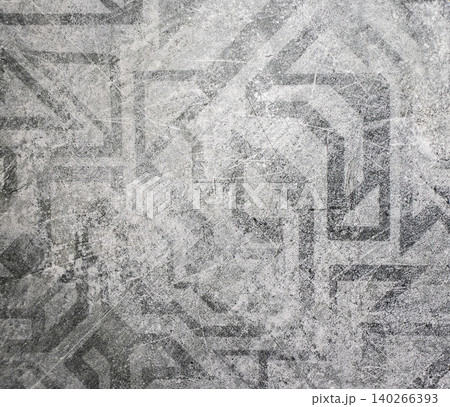 Distressed Ancient Geometric Pattern on Light Gray Background Texture 140266393