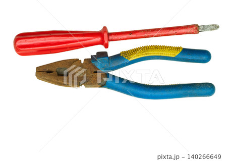 Screwdriver and pliers from the home shed for repair 140266649