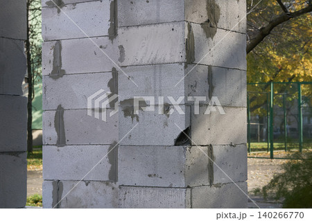 Construction.Support pillar made of brick blocks for building wall 140266770