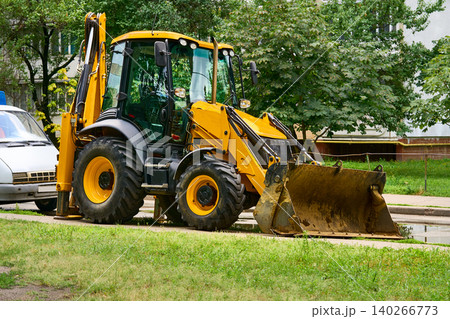 Break from work.Grader bulldozer with a large bucket Break from work.Grader bulldozer with a large bucket 140266773