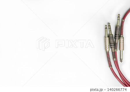 Four electric cables with jacks.Connection electric guitar,sound equipment Four electric cables with jacks.Connection electric guitar,sound equipment 140266774