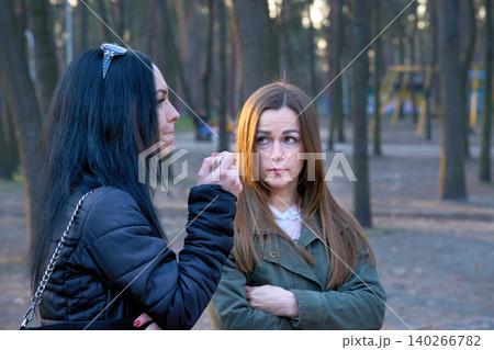 Women talking.Two young women girlfriends,serious conversation discussion Women talking.Two young women girlfriends,serious conversation discussion 140266782