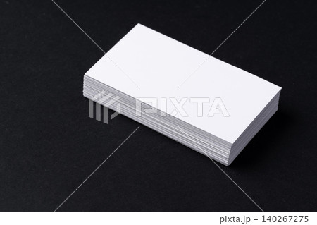 White blank business cards on dark black background 140267275