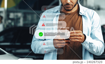 Scam call text message warning sent to a person at a car park location in the daytime 140267320
