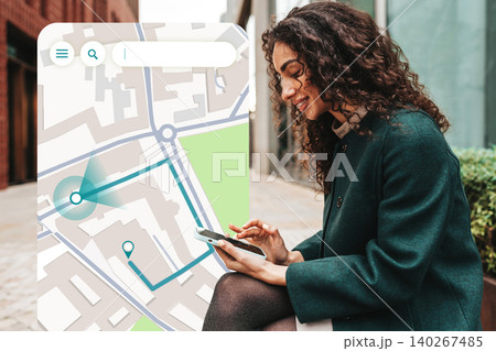 Woman using a smartphone to plan taxi route on a map in an urban area during the daytime Woman using a smartphone to plan taxi route on a map in an urban area during the daytime 140267485