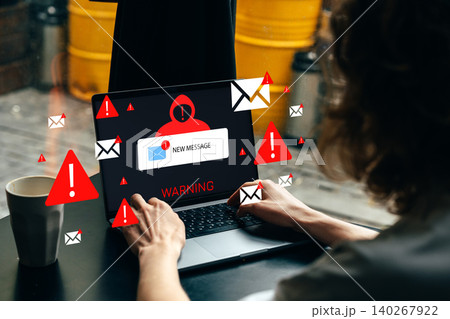 User receives warning about scam call sms message while checking laptop at home User receives warning about scam call sms message while checking laptop at home 140267922
