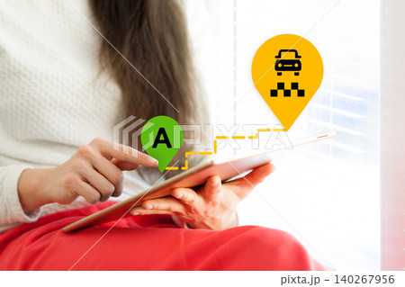 User selects a pickup location on a taxi route map using a tablet device User selects a pickup location on a taxi route map using a tablet device 140267956