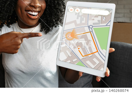 Person shows tablet with travel map and taxi route for navigation in urban area 140268074