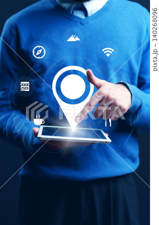 Man using tablet to select taxi route on map for travel navigation in city Man using tablet to select taxi route on map for travel navigation in city 140268096