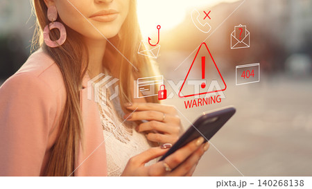 Person receives a scam call text message warning about possible fraud attempts Person receives a scam call text message warning about possible fraud attempts 140268138
