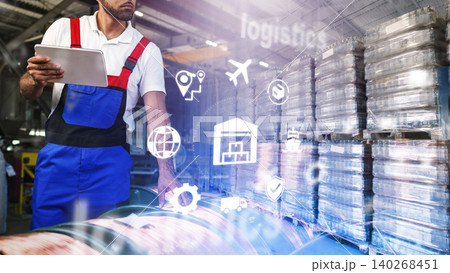 Logistics worker managing inventory with technology in a warehouse setting 140268451