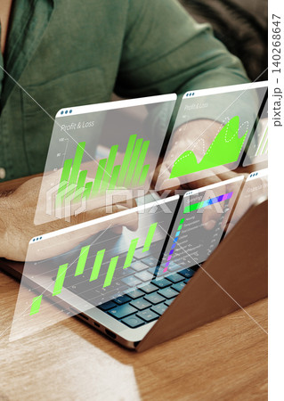 Digital business chart displaying profit and loss data on a laptop screen Digital business chart displaying profit and loss data on a laptop screen 140268647