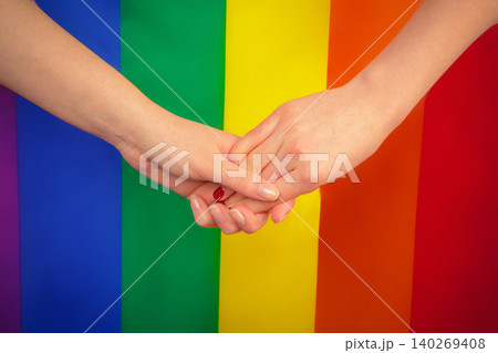 Young lesbian couple on color background. creative photo. Young lesbian couple on color background. creative photo. 140269408