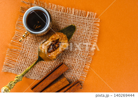 Close up photo of turkish national desserts with cup of coffee 140269444