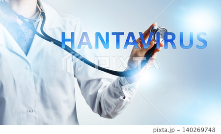 Stethoscope held by a doctor with the word hantavirus displayed clearly in the background Stethoscope held by a doctor with the word hantavirus displayed clearly in the background 140269748