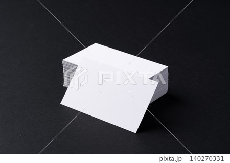 White blank business cards on dark black background White blank business cards on dark black background 140270331