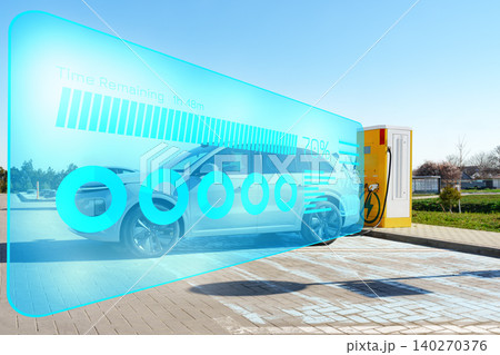 Electric car charging station showing details and progress in a sunny outdoor setting Electric car charging station showing details and progress in a sunny outdoor setting 140270376