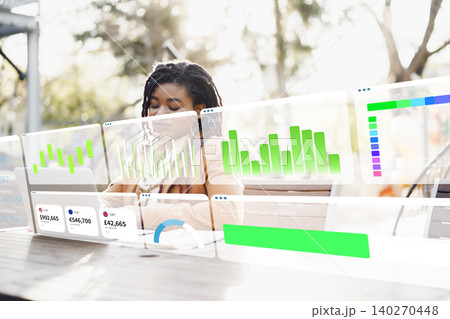 Working on a digital business chart with AI tools in a modern office setting Working on a digital business chart with AI tools in a modern office setting 140270448