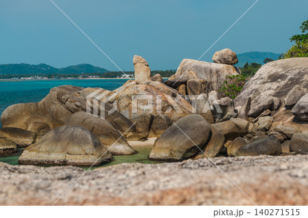 Hin Ta Grandfather Rock formation on Koh Samui island with large granite boulders and calm tropical sea near Lamai beach Hin Ta Grandfather Rock formation on Koh Samui island with large granite boulders and calm tropical sea near Lamai beach 140271515