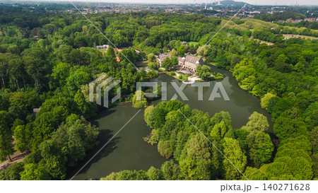 Aerial view of Schloss Borbeck surrounded by lake and green park landscape in Essen Germany 140271628
