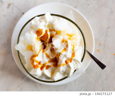 Ile flottante with caramel sauce, french dessert Ile flottante with caramel sauce, french dessert 140273127