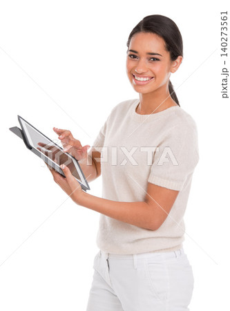 Woman, tablet and portrait in studio for online, research and e learning on college website. Smile of a student or model typing, scroll and education on digital technology and a white background Woman, tablet and portrait in studio for online, research and e learning on college website. Smile of a student or model typing, scroll and education on digital technology and a white background 140273561