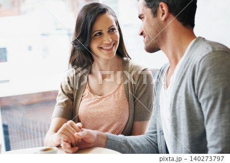 Couple, holding hands and love on date at cafe, restaurant and coffee shop for connection, bonding and care. Girlfriend, boyfriend or lovers with affection, smile or happy for tea, espresso or drink Couple, holding hands and love on date at cafe, restaurant and coffee shop for connection, bonding and care. Girlfriend, boyfriend or lovers with affection, smile or happy for tea, espresso or drink 140273797