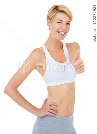 Portrait, wink and woman with thumbs up for fitness with emoji isolated on a white studio background. Smile, sport and person with like hand gesture for success, exercise and workout for healthy body Portrait, wink and woman with thumbs up for fitness with emoji isolated on a white studio background. Smile, sport and person with like hand gesture for success, exercise and workout for healthy body 140273922
