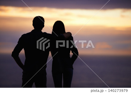 Back, sunset sky and couple hug with silhouette, view outdoor with nature and travel together for love and bonding. Adventure, journey and people in environment, mockup space with support and trust 140273979