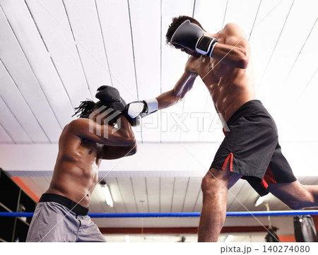 Men, punch and practice for match in ring, fitness and topless for exercise and workout. People, low angle and performance for challenge or fighting, training and combat for competition in sports Men, punch and practice for match in ring, fitness and topless for exercise and workout. People, low angle and performance for challenge or fighting, training and combat for competition in sports 140274080